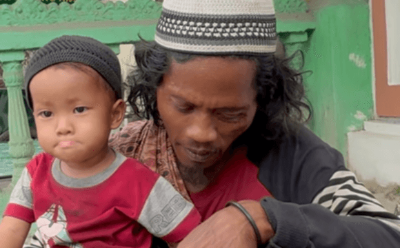 No Rest, No Surrender: A Scavenger's Love for His Child